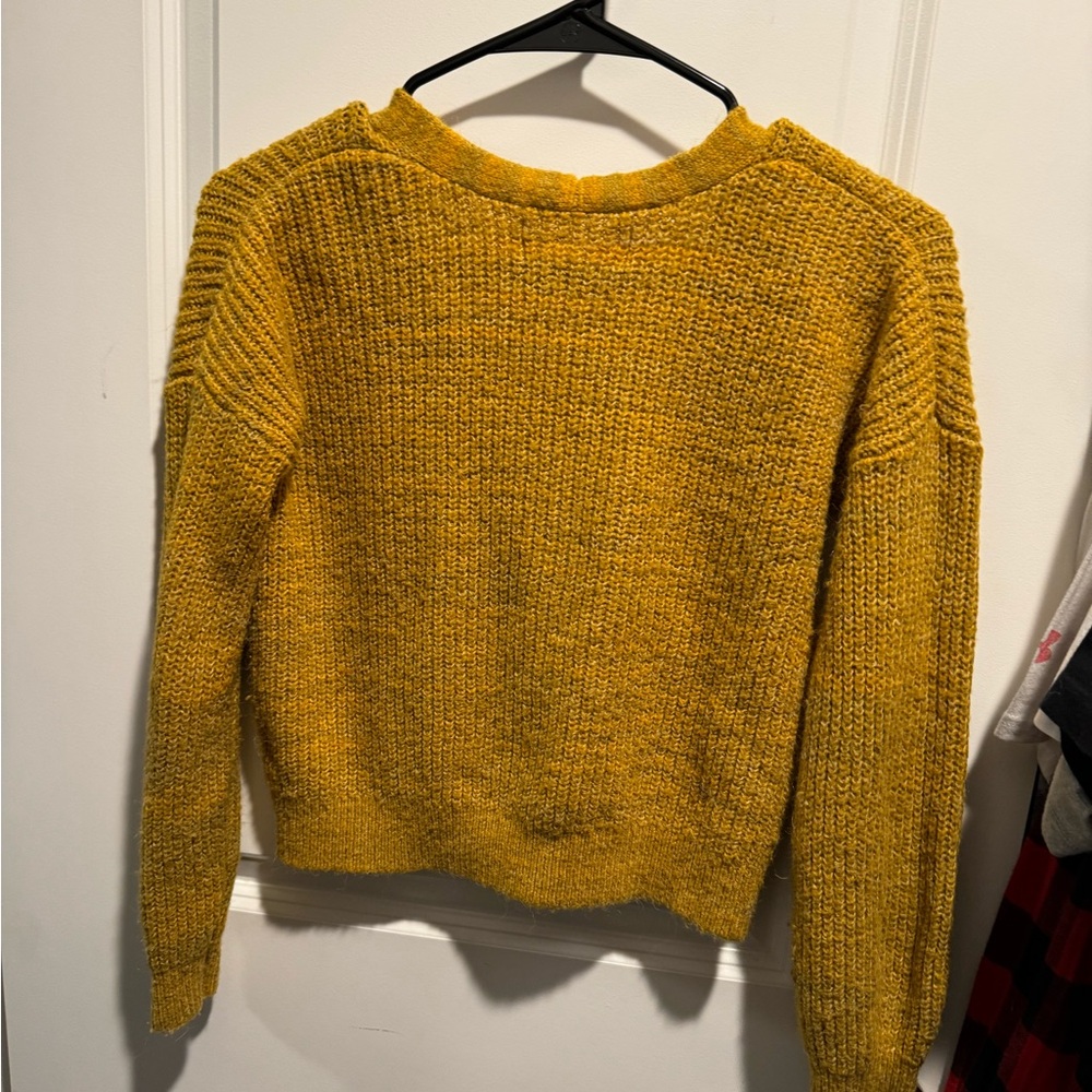 2 young ladies sweaters